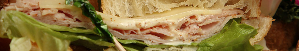 Eating Sandwich at Hazel's Kitchen restaurant in Tulare, CA.